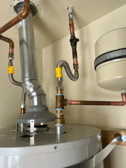 Water heater installation and plumbing repair in Burschville